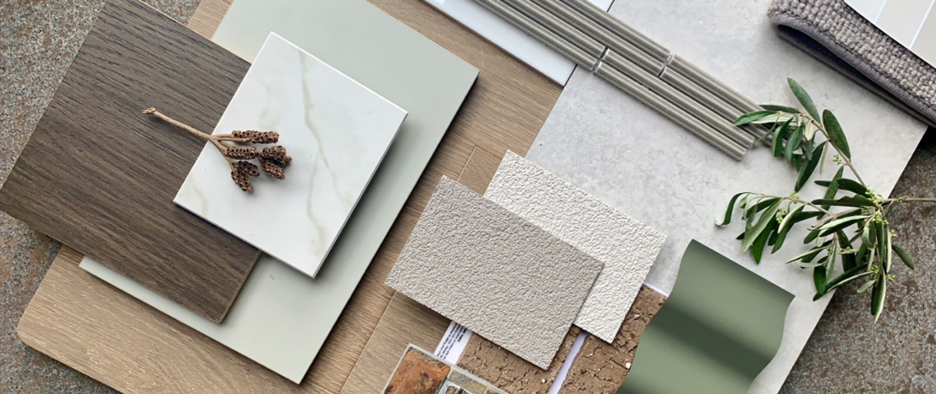 Emma Hussey, Interior Designer and Colour Consultant from Henley Homes explains the colour scheme behind her flatlay that pays homage to the Central Australian Landscape using COLORBOND® steel colour Dune® and Mangrove®.