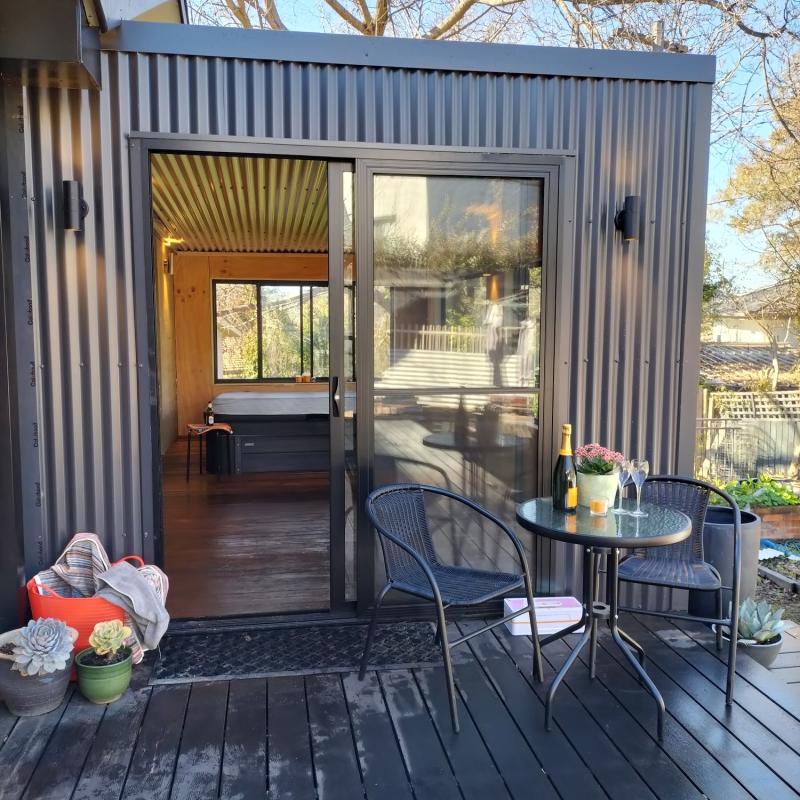 Julie from Curtin, ACT loves COLORBOND® steel. Spa room Roofing, Guttering & Fascia made from COLORBOND® steel in colours Monument® and Dune® Matt