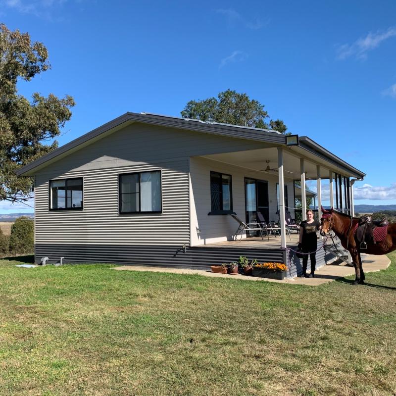 Don & Kris from Elbow Valley, QLD loves COLORBOND® steel. Roofing, Guttering & Fascia, Walling made from COLORBOND® steel in colours Basalt® Matt and Dune® Matt