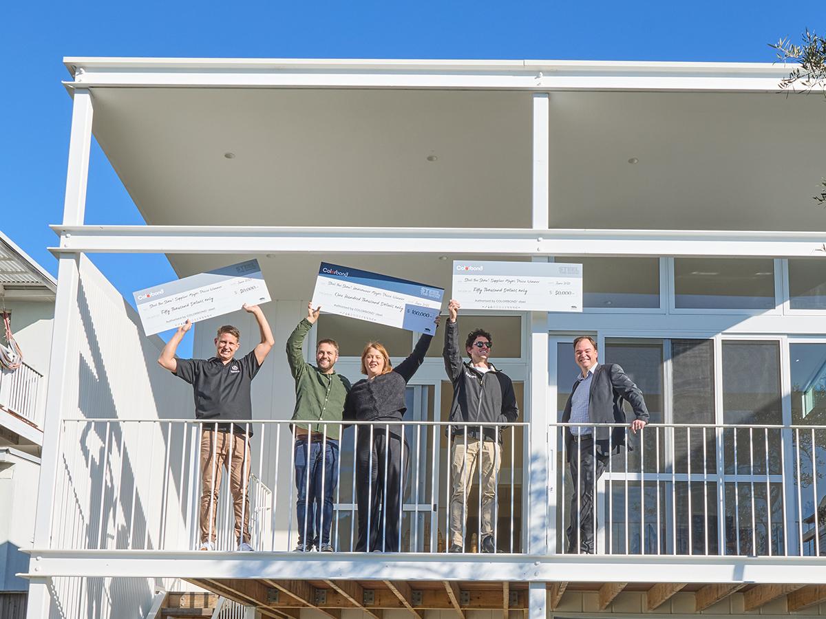 Steel The Show - Grand Prize Winners - People Standing on a double story house balcony, photo taken from the street