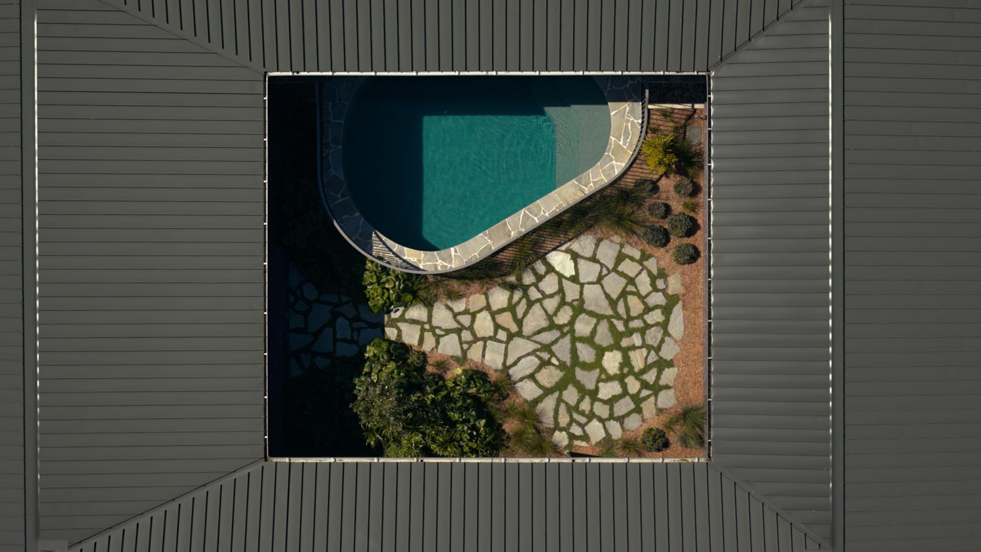 Corrimal Home in Corrimal NSW with COLORBOND® steel in Woodland Grey® in a classic finish.